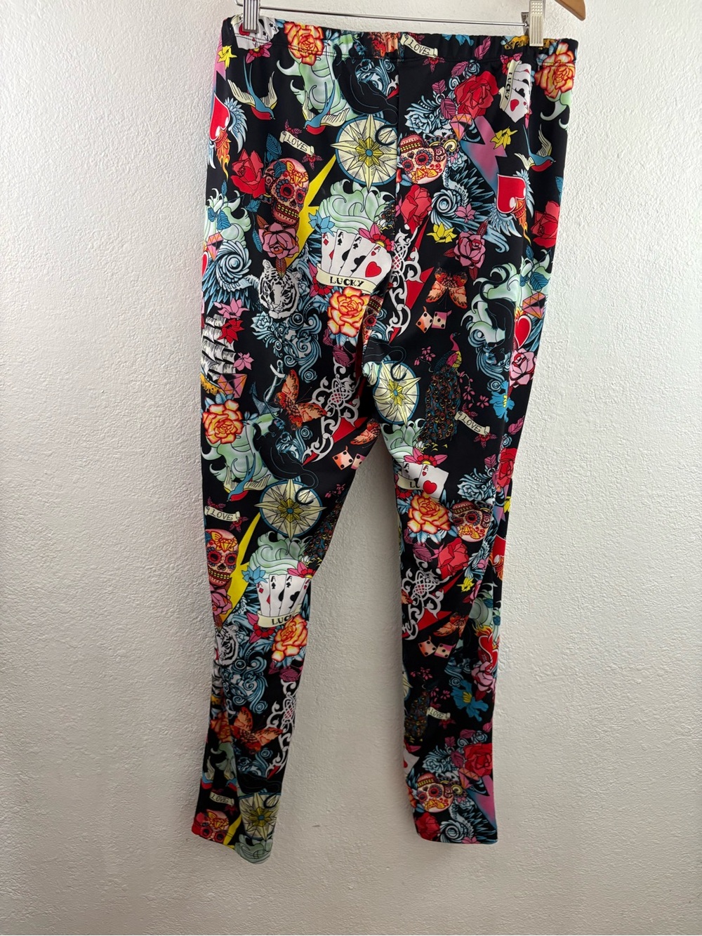 Torrid leggings featuring a vibrant, multi-colored tattoo-inspired print size 3X - Picture 5 of 6